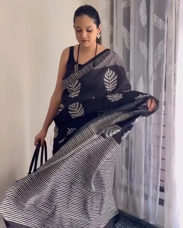 Shadow_Petals_-_Black_Linen_Saree_with_Black_Blouse_and_Floral_Accent