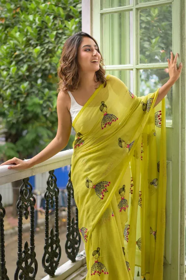 Yellow_Mulmul_Cotton_Saree_with_Cute_Embroidery_Motifs_&_Tassels,_with_Blouse_Piece