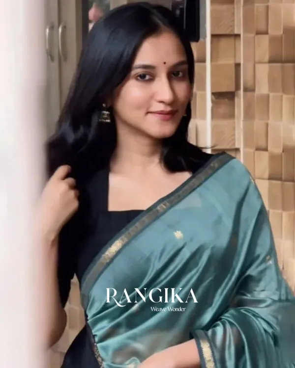 Bottle_Green_And_Black_Premium_Cotton_Silk_Saree_With_Classy_Blouse_and_tassels