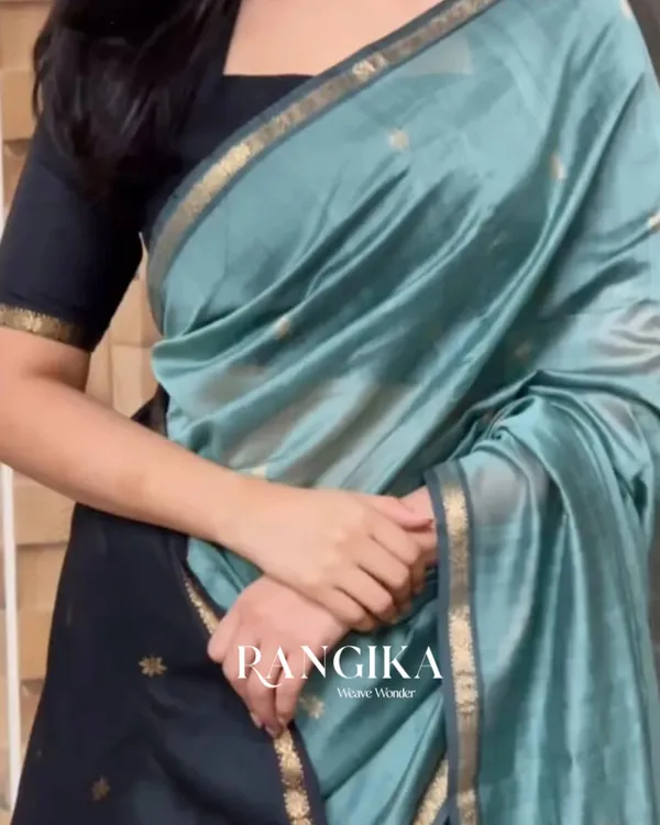 Bottle_Green_And_Black_Premium_Cotton_Silk_Saree_With_Classy_Blouse_and_tassels