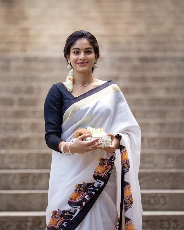 Shweta_Gaj_-_Classic_White_Linen_Saree_with_Elephant_Motif_Border_&_Blouse_Piece