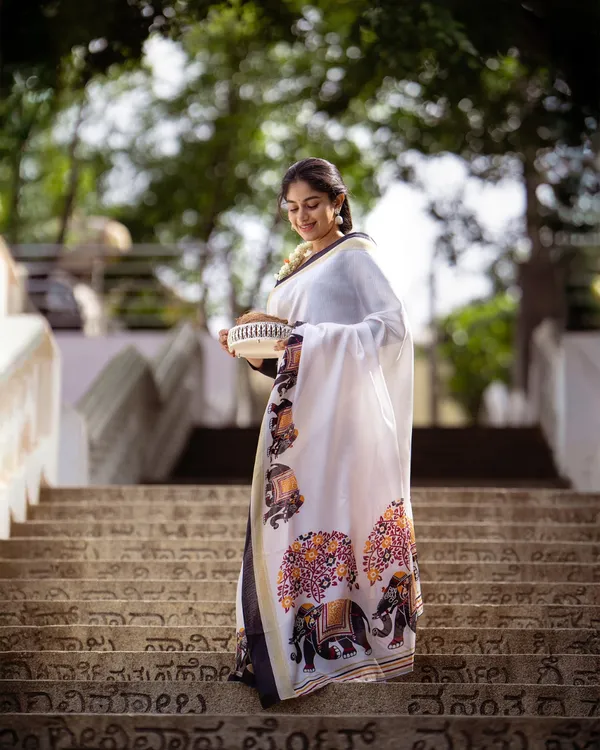 Shweta_Gaj_-_Classic_White_Linen_Saree_with_Elephant_Motif_Border_&_Blouse_Piece
