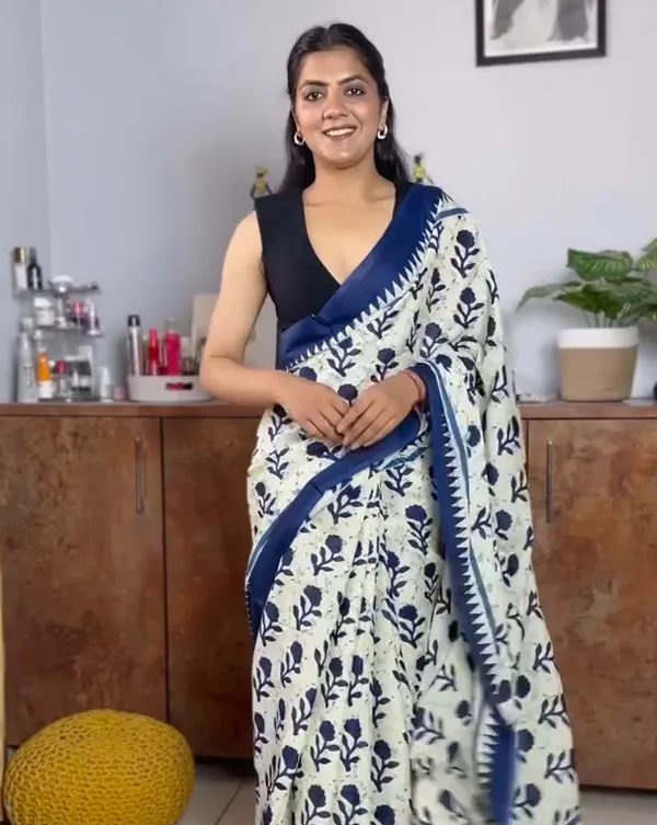 Safed_Neel_-_White_Linen_Drape_with_Blue_Border_and_Black_Blouse_Fabric