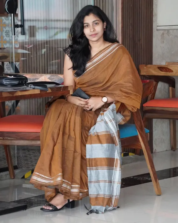 Tejas_Dhara_-_Saffron_Linen_Saree_with_Silver_Border_Design_&_Blouse_Piece