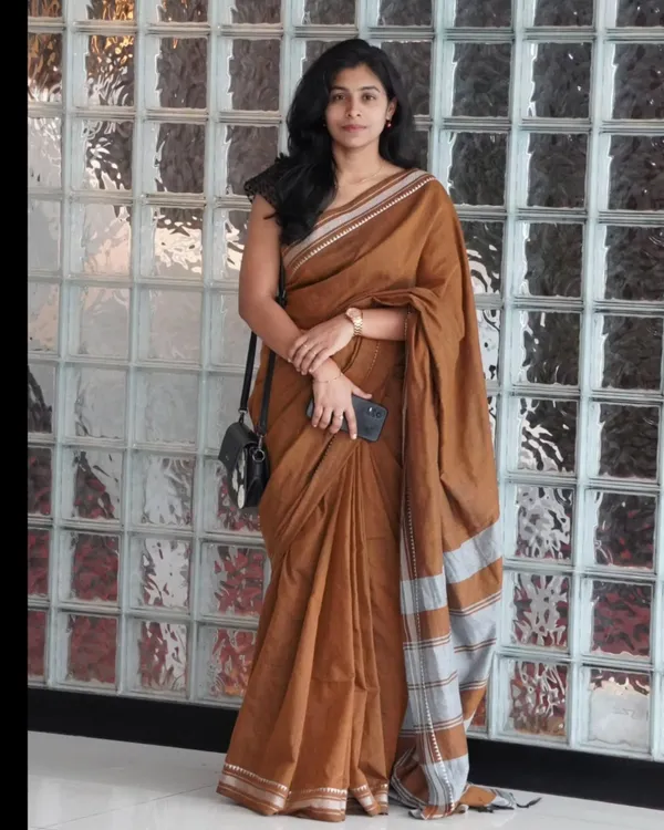 Tejas_Dhara_-_Saffron_Linen_Saree_with_Silver_Border_Design_&_Blouse_Piece