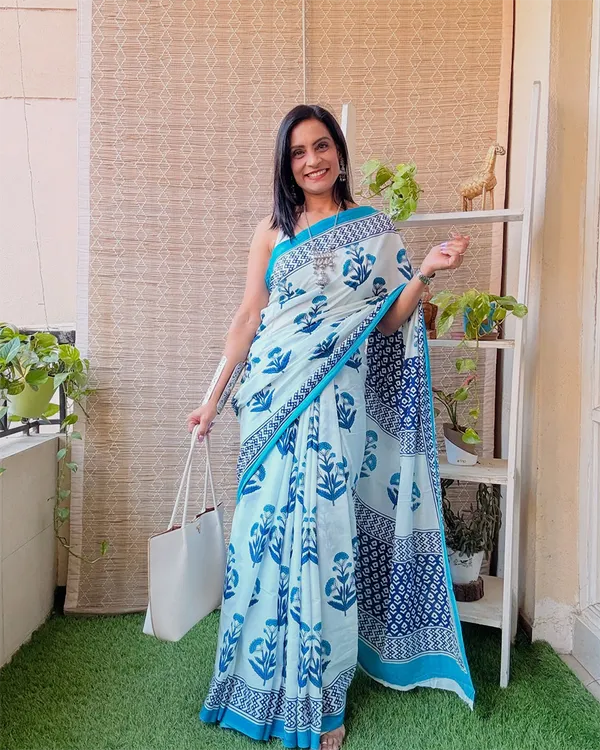 Neelpari_-_White_Linen_Saree_with_Blue_Flower_Work_&_Blouse