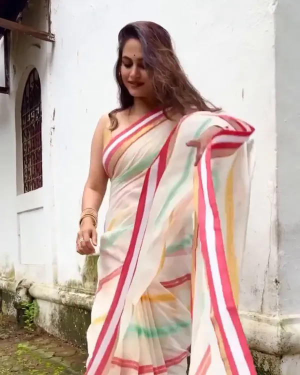 Pratham_Jyot_-_Pure_White_Linen_Saree_with_Vibrant_Multicolor_Stripe_Border_&_Blouse_Piece