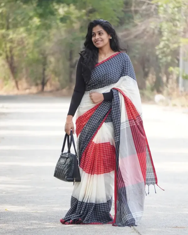 Ragini_Mala_-_Graceful_Black-White-Red_Linen_Saree_with_Subtle_Red_Border_&_Blouse_Piece