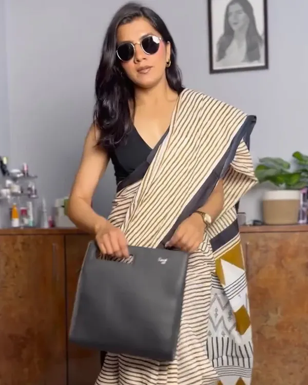 Ivory_Ink_-_Cream_Linen_Saree_with_Lining_Pattern,_Black_Border_&_Blouse