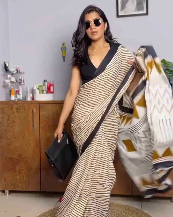 Ivory_Ink_-_Cream_Linen_Saree_with_Lining_Pattern,_Black_Border_&_Blouse