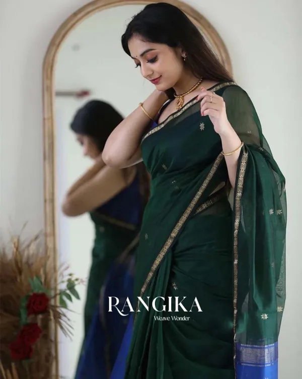 Green_Color_Premium_Cotton_Silk_Saree_With_Classy_Navy_Blue_Blouse_and_tassels