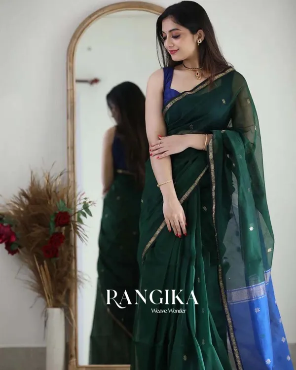 Green_Color_Premium_Cotton_Silk_Saree_With_Classy_Navy_Blue_Blouse_and_tassels