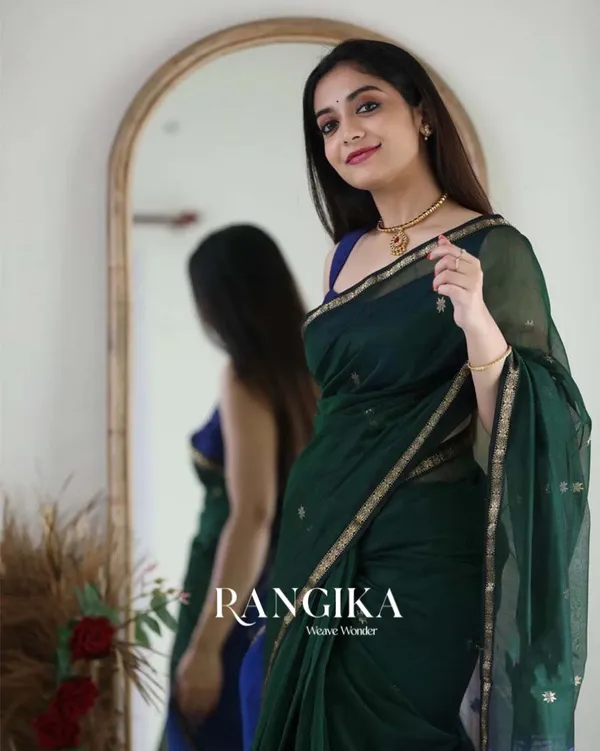 Green_Color_Premium_Cotton_Silk_Saree_With_Classy_Navy_Blue_Blouse_and_tassels