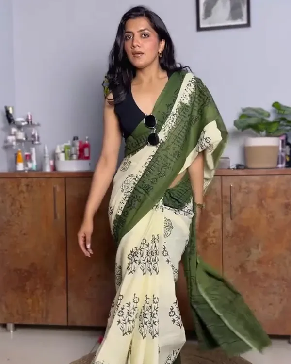Leaf_Aura_-_Green_Linen_Saree_with_Oversized_Flower_Motifs_&_Black_Blouse