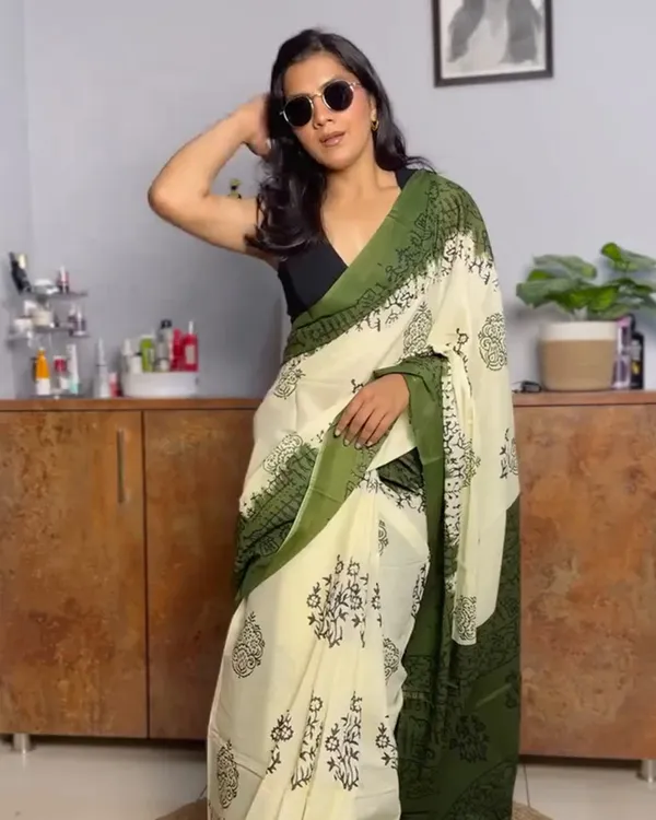 Leaf_Aura_-_Green_Linen_Saree_with_Oversized_Flower_Motifs_&_Black_Blouse