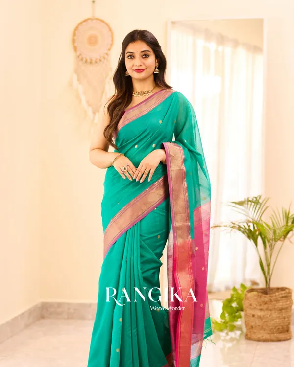 Bottle_Green_Color_Premium_Cotton_Silk_Saree_With_Classy_Blouse_and_tassels