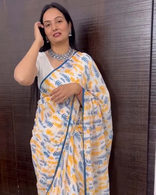 Icy_Edge_-_White_Linen_Saree_with_Small_Blue_Border_&_White_Blouse