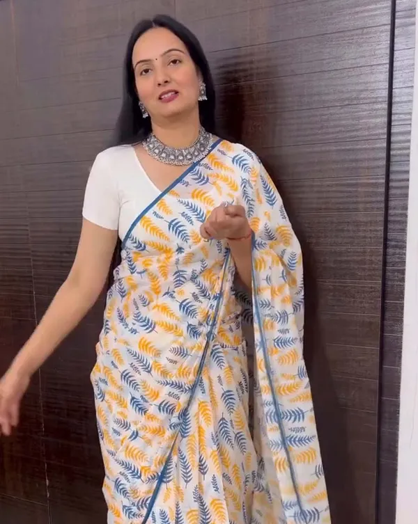 Icy_Edge_-_White_Linen_Saree_with_Small_Blue_Border_&_White_Blouse