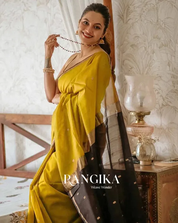 Mustard_Yellow_And_Black_Premium_Cotton_Silk_Saree_With_Classy_Blouse_and_tassels