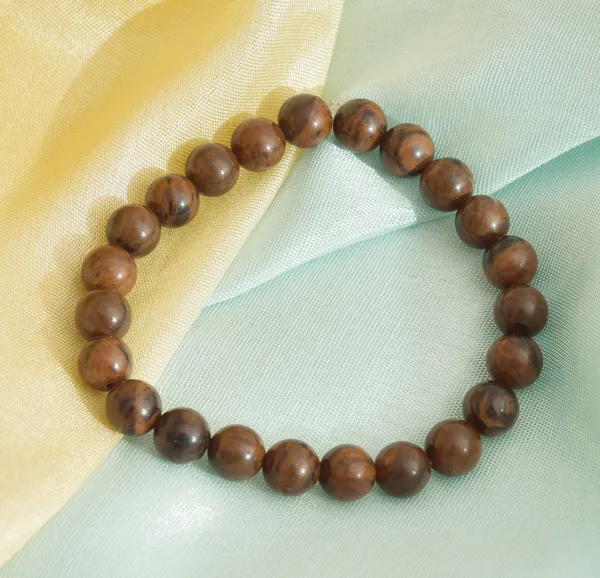 Bronzite_(Brown_with_Metallic_Sheen)
