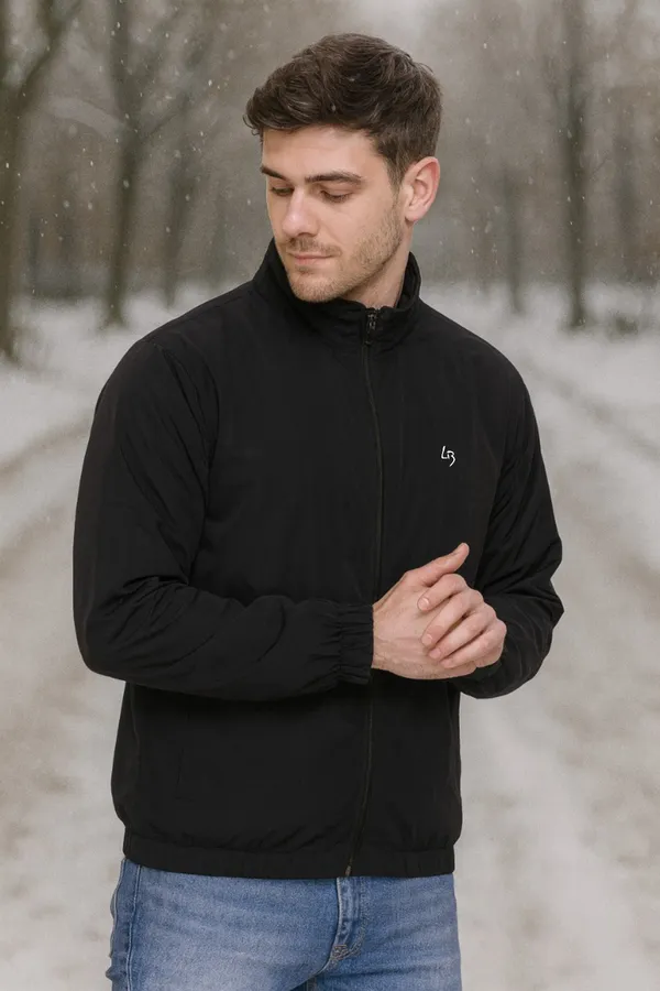Black_Polyester_Blend_Solid_Dri_Fit_Jacket_With_Zip_Pockets_And_Inside_Net_For_Men
