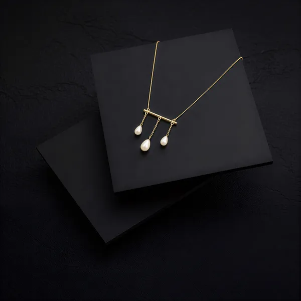 Gold_Triple_Pearl_Drop_Bar_In_Polished_Brass_Modern_Teardrop_On_Delicate_Tone_Chain_Dokiya_For_Women_And_Girl