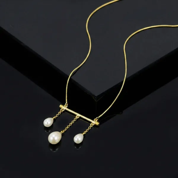 Gold_Triple_Pearl_Drop_Bar_In_Polished_Brass_Modern_Teardrop_On_Delicate_Tone_Chain_Dokiya_For_Women_And_Girl