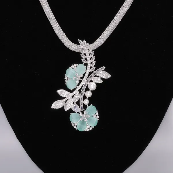 Turquoise_Temptation_American_Diamond_Pendant_&_Earring_Set__For_Women