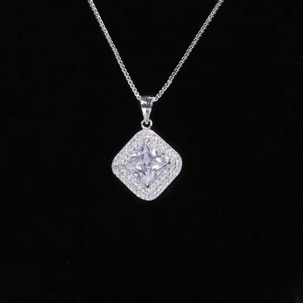 Silver_Sparkling_Silver_American_Diamond_Pendant_&_Earring_Set_For_Women