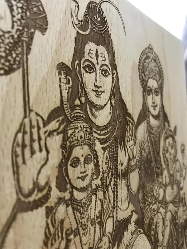 Brown_Lord_Shiva_Pariwar_With_Ma_Parwati,_Lord_Ganesha_And_Lord_Murugan/_Kartikeya_Wooden_Engraved_Photo_Frame/_Idol_For_Home_And_Office_Temple/_Desk_(9_X_7_In)