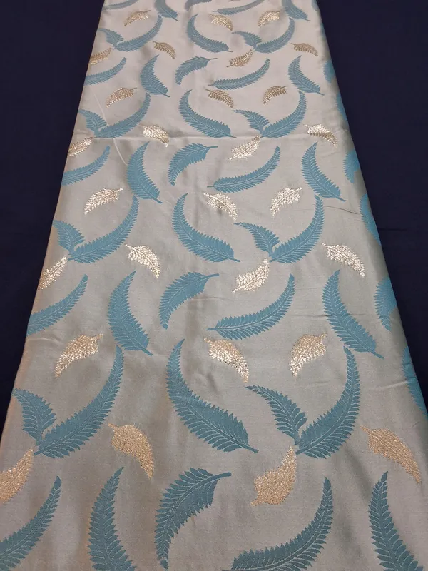 Powder_Blue_Jaquard_Silk_Saree_With_Unstitched_Blouse