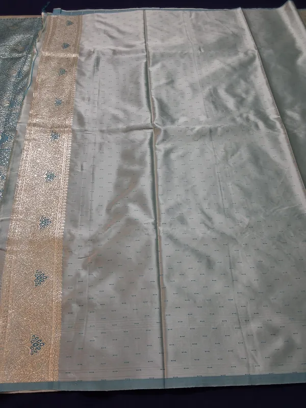 Powder_Blue_Jaquard_Silk_Saree_With_Unstitched_Blouse