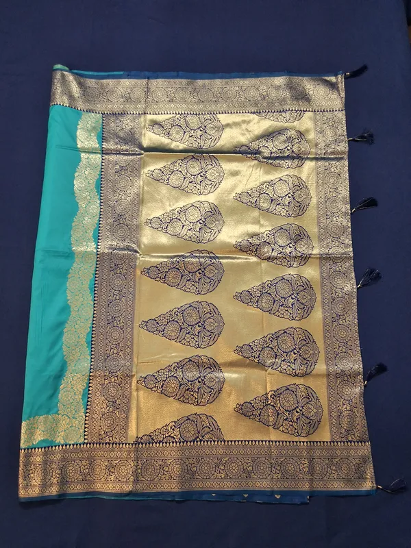 Teal_Green_&_Navy_Banarasi_Silk_Saree_With_Unstitched_Blouse