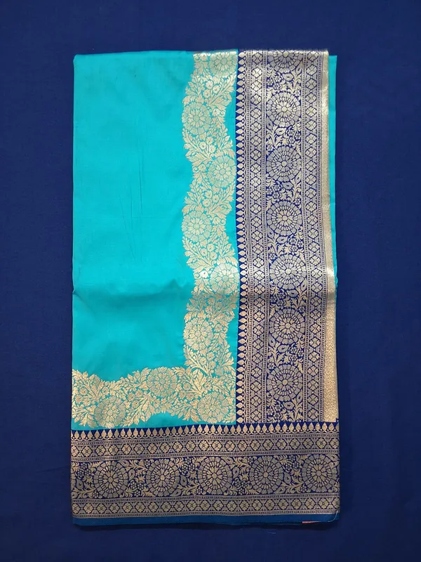Teal_Green_&_Navy_Banarasi_Silk_Saree_With_Unstitched_Blouse