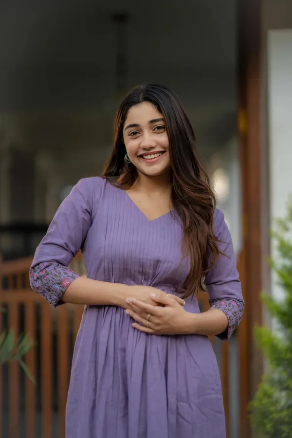 Purple_Flared_Kurti_With_Embroidered_Sleeves_For_Women