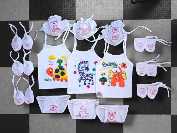 Set_Of_3_White_Cartoon_Printed_Jhabla_Set_|_Jhabla,_Cap,_Nappy,_Mittens_Pair_And_Booties
