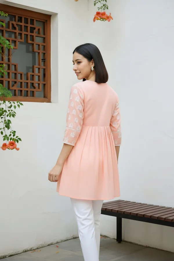 Elegant_Peatch_Chikankari_Peplum_Top_with_Lace_Embellished_Kedia_Neckline