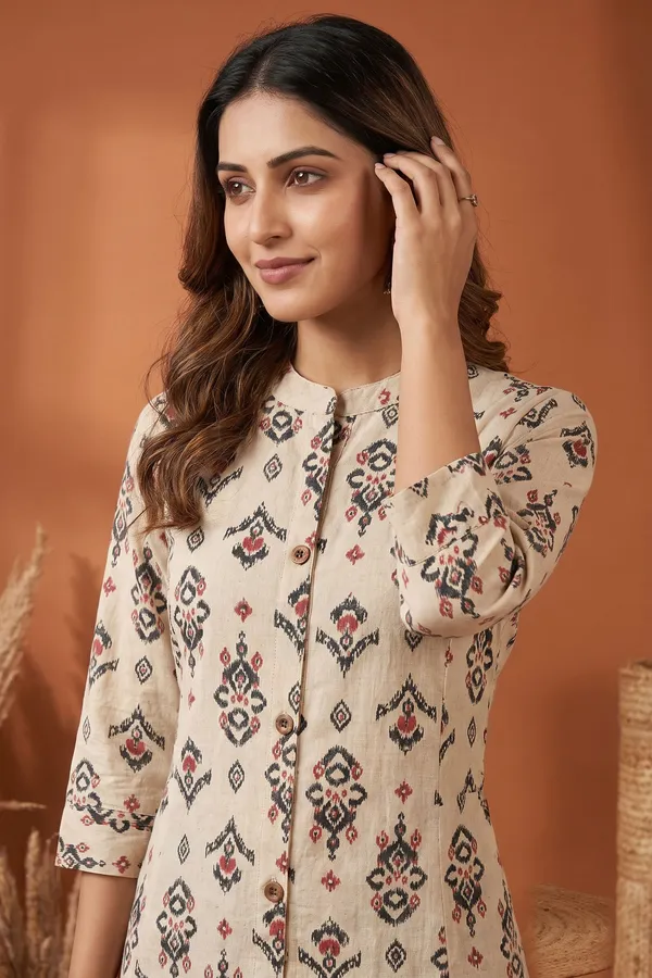 Elegant_Cream_Cotton_A_Line_Princess_Cut_Kurta_with_Ikat_Inspired_Ethnic_Print
