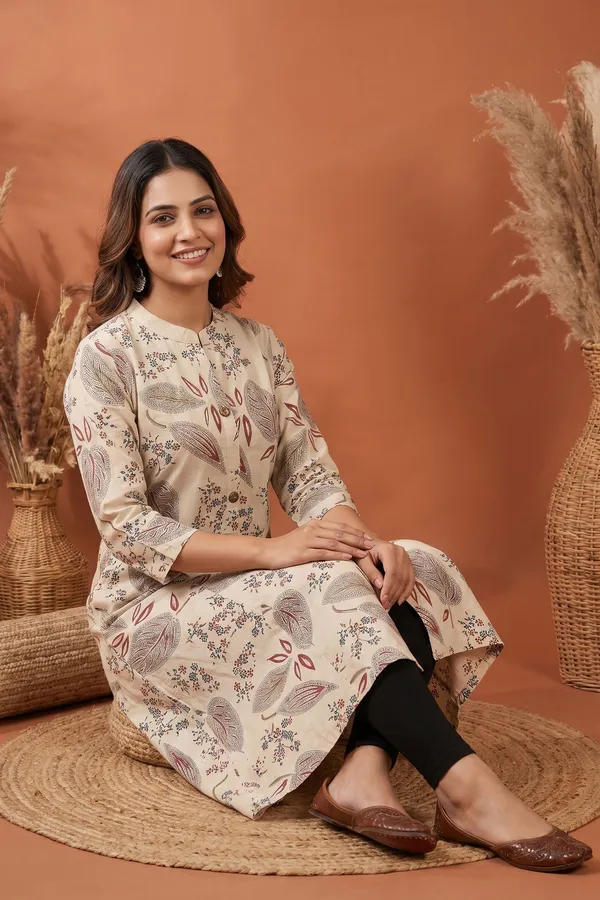 Elegant_Cream_Cotton_A_Line_Princess_Cut_Kurta_with_Leaf_Print