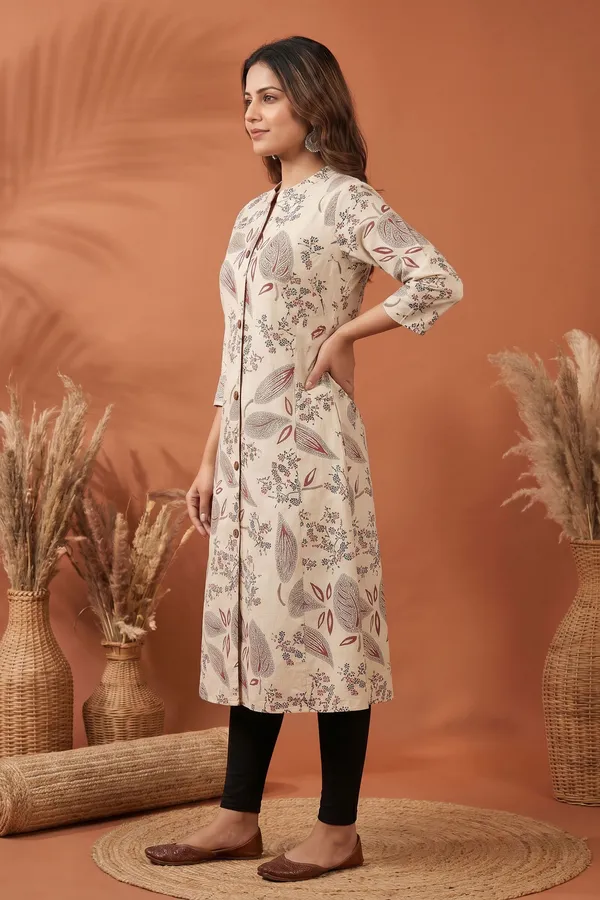 Elegant_Cream_Cotton_A_Line_Princess_Cut_Kurta_with_Leaf_Print
