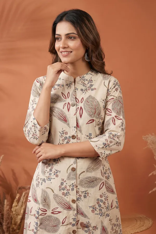Elegant_Cream_Cotton_A_Line_Princess_Cut_Kurta_with_Leaf_Print