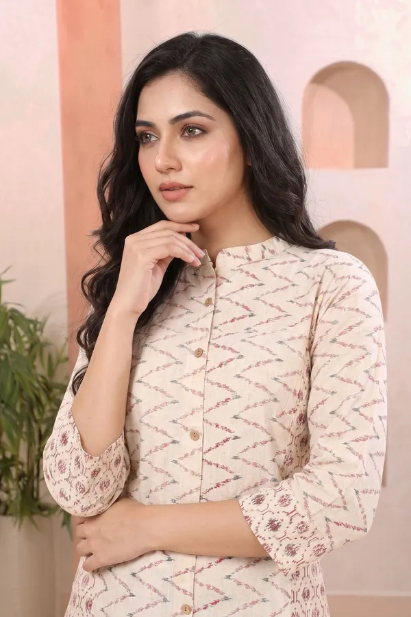 Elegant_Ivory_Cotton_Long_Kurti_with_Ban_Collar_Princess_Cut_Geometric_Print