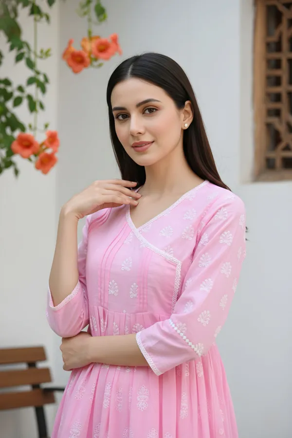 Elegant_Pink_Chikankari_Peplum_Top_with_Lace_Embellished_Kedia_Neckline