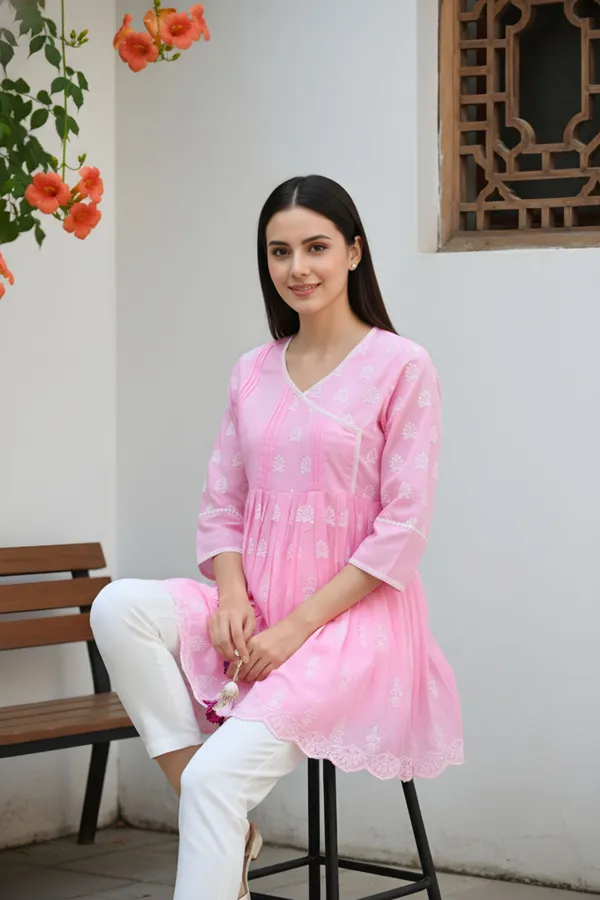 Elegant_Pink_Chikankari_Peplum_Top_with_Lace_Embellished_Kedia_Neckline