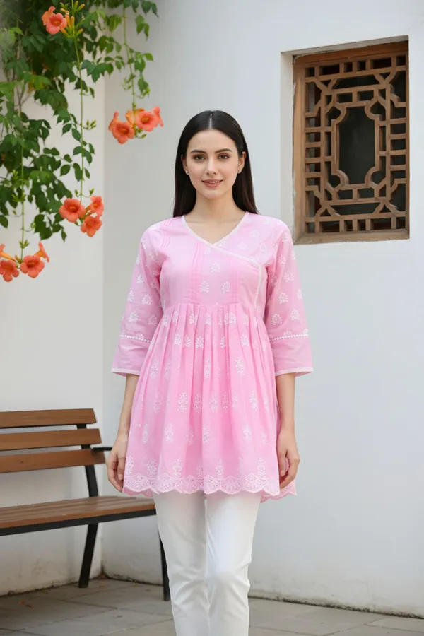 Elegant_Pink_Chikankari_Peplum_Top_with_Lace_Embellished_Kedia_Neckline
