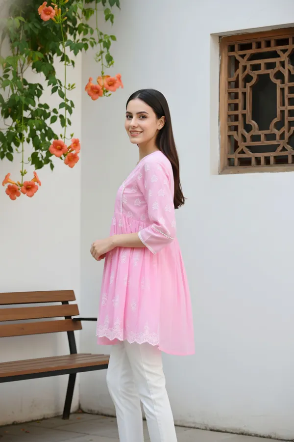 Elegant_Pink_Chikankari_Peplum_Top_with_Lace_Embellished_Kedia_Neckline