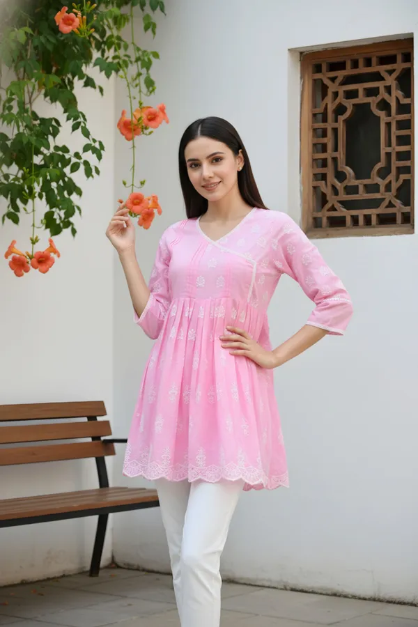 Elegant_Pink_Chikankari_Peplum_Top_with_Lace_Embellished_Kedia_Neckline