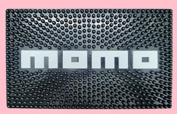 Anti-Slip_Dashboard_Sticky_Pad_–_MOMO_Black_&_White_|_Universal_Car_Phone_Holder_Mat_&_Interior_Accessory