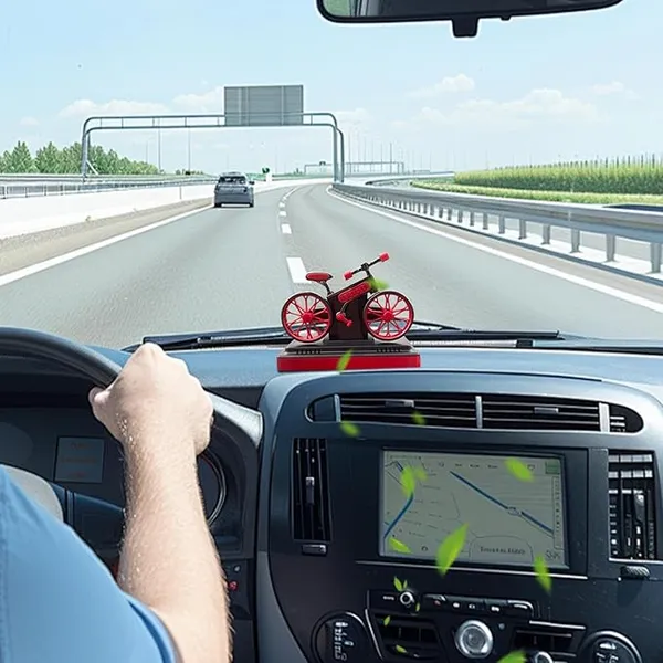 Bicycle_Dashboard_Air_Freshener_with_Rotating_Wheels_–_Stylish_Car_Interior_Decor_with_Long-Lasting_Aroma_Core_(Red)