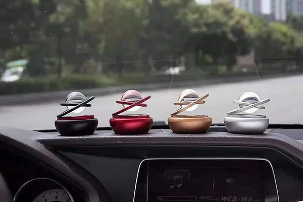 Solar_Car_Perfumes_&_Fresheners,_Double_Ring_Crystal_Auto_Rotate_Car_Perfume_Air_Car_Fresheners_(Red)